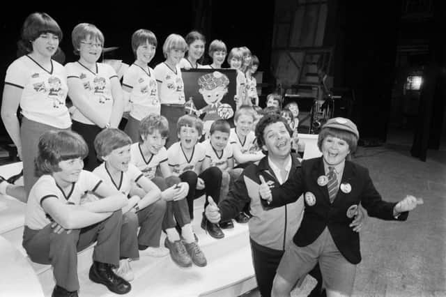The Krankies - Janette Tough and Ian Tough - with a group of children at the theatre in May 1982.