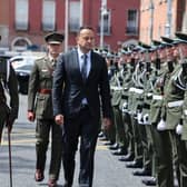 Taoiseach Leo Varadkar inspecting a guard of honour from the Defence Forces prior to the ceremony of reconciliation and remembrance for those who lost their lives during the Civil War in the Garden of Remembrance in Dublin