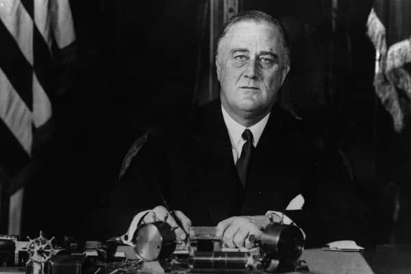 circa 1940:  American President Franklin Delano Roosevelt (1882 - 1945) at his desk.  (Photo by Hulton Archive/Getty Images)