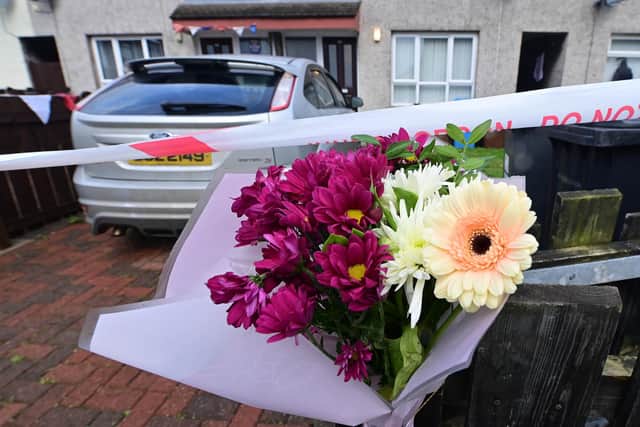 Flowers at the scene  of the murder of Liam Christie who was shot  up to four times at close range in Antrim.