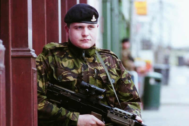 Soldiers of the Royal Artillery Regiment on patrol in Aughnacloy, County Tyrone. They were part of the 400 strong group which are to be withdrawn from the province, the first troops to be pulled out since the IRA ceasefire.