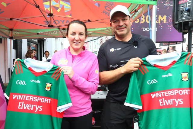 Former Irish rugby captain Rory Best with his wife Jodie with Mayo Jerseys, after he walked 330km across Ireland to raise money for the Cancer Fund for Children.