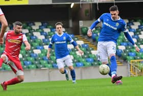 Linfield's Kyle Lafferty has a shot at goal on his debut against Cliftonville