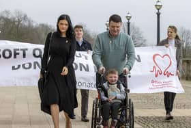 Six-year-old Daithi Mac Gabhann and his parents Mairtin Mac Gabhann (right) and mother Seph Ni Mheallain (left) arrive at Parliament Buildings at Stormont, ahead of a recalled sitting of the Assembly focused on a stalled organ donation law. The law introducing an opt-out donation system in Northern Ireland has been named after Daithi, who is awaiting a heart transplant.. Picture date: Tuesday February 14, 2023.