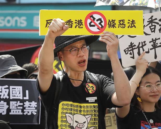 A protest in Taipei, Taiwan against Hong Kong's new national security law recently approved by Hong Kong lawmakers, on Saturday. If the international community fails to act against China’s latest actions, its next target will be Taiwan (AP Photo/Chiang Ying-ying)