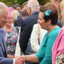 Geri Martin from The Chocolate Manor pictured with King Charles III at Hillsborough Garden Party last year. Geri had the privilege of meeting both the King and Queen and chatted to them about her Castlerock business playing a small role in marking their accession to the throne. The King also thanked Geri for the gift of the truffles on his visit in September 2022