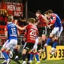 Daniel Finlayson (second right) scores to send Linfield top of the Sports Direct Premiership table with a dramatic injury-time victory by 2-1 over Crusaders at Seaview. (Photo by Andrew McCarroll/Pacemaker Press)