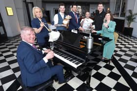 Staff of Titanic Hotel Belfast are in seventh heaven with the news that the hotel has been awarded Northern Ireland’s Leading Hotel at the World Travel Awards for the seventh consecutive year. Pictured celebrating with Adrian McNally, general manager, are Dorota Niedziewiez, room attendant, Justin Stewart, bartender, Matthew Poole, deputy general manager, Seamus Christie, Sous chef, Chris Flanagan, maintenance manager and Yvonne McIlree, director of sales and marketing