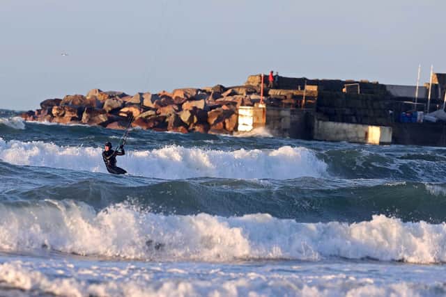 Surfing at Portrush at new year. The weather in Northern Ireland this week was often stormy or miserable and yet the sun kept breaking through. And there is now a full extra 30 minutes of daylight in the evening. Pic Steven McAuley