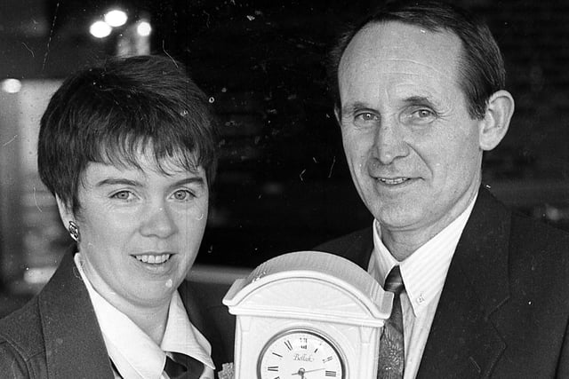 Patricia McCauley, manageress of the Belleek Pottery Visitors’ Centre, and Jim Nelson, manager of Antrim Senior Hurling team, pictured at the end of February 1992, with a Belleek clock, one of the many valuable prizes which were to be won at the Belleek Antrim Celebrity Golf Open which was to take place at Cushendall Golf Club on Saturday, April 25, 1992. Picture: News Letter archives