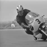 Phil Read racing at the Silverstone Circuit in Northamptonshire, 1965. (Photo by Daily Express/Hulton Archive/Getty Images)