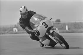 Phil Read racing at the Silverstone Circuit in Northamptonshire, 1965. (Photo by Daily Express/Hulton Archive/Getty Images)