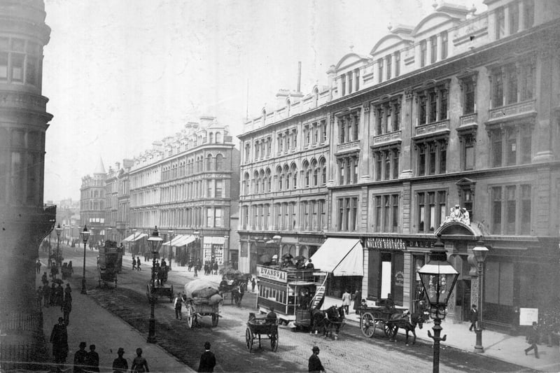 1875:  Horse drawn trams and hackney cabs on a Belfast Street.  (Photo by Hulton Archive/Getty Images)