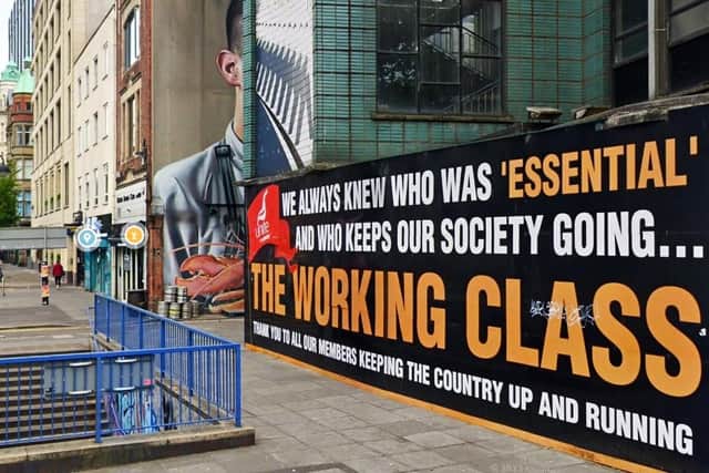 The old Unite building in Belfast with its hoarding hailing the working classes