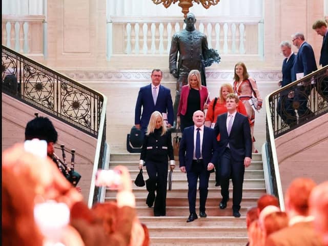The US ambassador to the UK  Jane Hartley, bottom left on the stairs, and party leaders including Sir Jeffrey Donaldson, top left, descend into the Great Hall at Stormont as part of the US Business Delegation event on Wednesday October 25 2023. The DUP leader could hardly have stayed away. Image taken from Northern Ireland Assembly @niassembly X feed