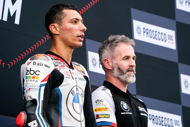 ROKiT BMW crew chief Phil Marron on the podium with Toprak Razgatlioglu at Donnington Park in the summer. Picture: Tony Goldsmith