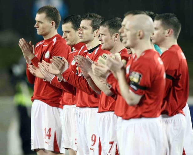 Cliftonville pay tribute to their former striker Keith Alexander following his death in 2010