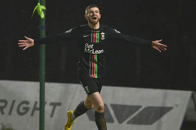 Glentoran’s Ruaidhri Donnelly celebrates scoring his second goal against Ballymena United