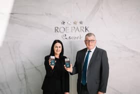 Roe Park Resort sales and marketing manager, Sinead McNicholl and general manager, George Graham are pictured demonstrating the resort’s new keyless card system which is part of the resort’s £720,000 sustainability investment programme