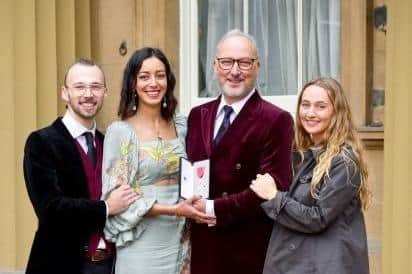 Peter Corry with his wife Fleur and children, Joshua and Molly, after receiving his MBE