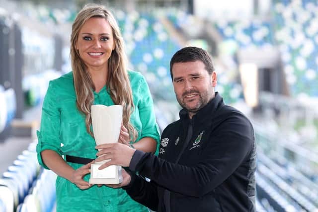 Linfield boss David Healy receives his Reavey Solicitors Manager of the Month award for March from Ruth Gorman.