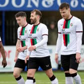 Glentoran players celebrate Niall McGinn's strike against Dungannon Swifts at Stangmore Park
