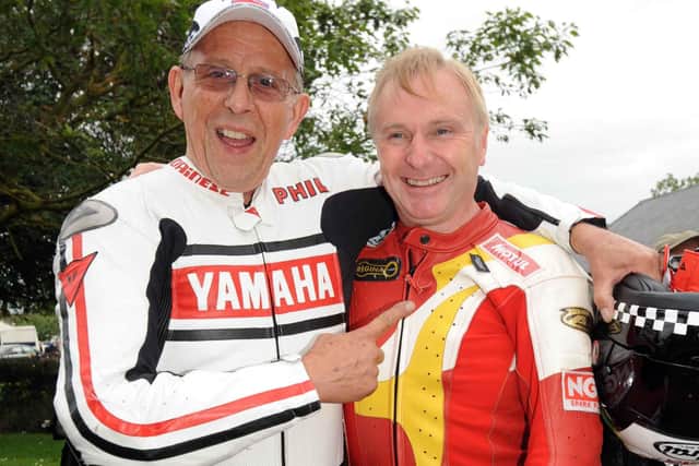 Phil Read with Northern Ireland's doubleTT Formula Two world champion Brian Reid at a motorcycle event in Ballymoney in 2009.