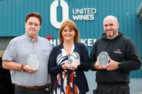 Three employees at Craigavon-based drinks firm United Wines have been recognised for their long service, having worked for the company for a combined total of 60 years. Pictured are transport manager Arthur Watson from Ards, head of finance Siobhan McSorley from Donaghmore and planning and transport supervisor Darren Lynn from Craigavon. Credit: Darren Kidd/ PressEye