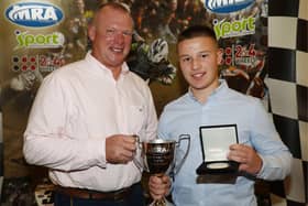 Ross Dillon celebrates his Semi Experts Quad title win with his father Nigel at the MRA Awards. Picture: Maurice Montgomery