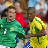 Northern Ireland's Steven Davis and Brazil's Fernandinho pictured at 2003 tournament.