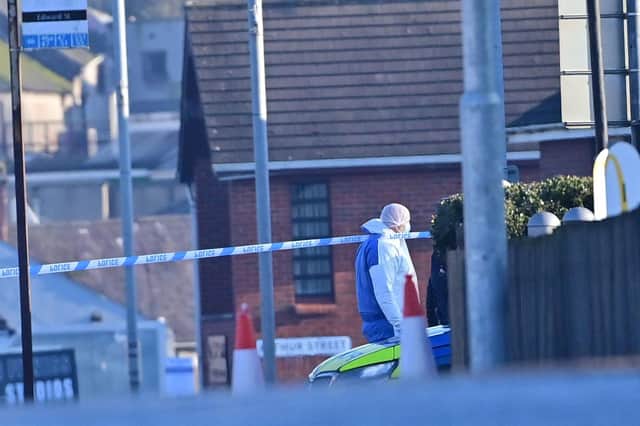 Forensics in the Edward Street area of Lurgan as police launch a murder inquiry. Photo: Colm Lenaghan/Pacemaker