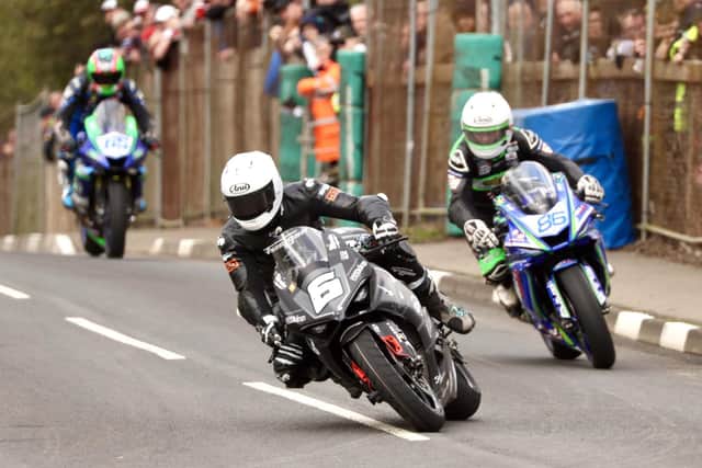 Michael Dunlop (MD Racing Ducati) on his way to victory in the Supersport race at this year's Cookstown 100 ahead of runner-up, Derek McGee and third-placed Michael Sweeney. (Photo by Stephen Davison/Pacemaker Press)