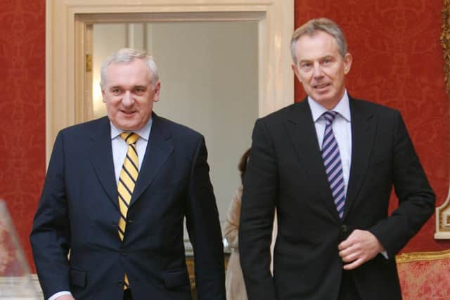 Former prime Minister Tony Blair (right), with former Irish premier Bertie Ahern, during a meeting at Dublin Castle which formed part of a series of events marking the 10th anniversary of the Good Friday Agreement. Niall Carson/PA Wire
