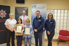 Chloe and Adam Sproule from Kesh, County Fermanagh being awarded for their bravery