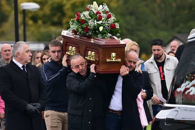 Family and friends attend the funeral of Sean Fox at Christ the Redeemer Church in Lagmore