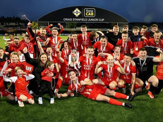 Enniskillen Rangers celebrate success by 2-0 in the fonaCAB Craig Stanfield Junior Cup final against Cleary Celtic at Dungannon's Stangmore Park. (Photo by Irish FA)