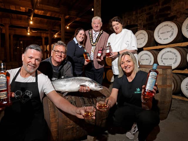 Mayor of Causeway Coast and Glens, councillor Steven Callaghan pictured with Gary Stewart, owner of Tartine at the Distillers Arms, Ruaridh Morrison, owner of North Coast Smokehouse, Laura Adams from Bushmills Distillery, celebrity chef Paula McIntrye and Wendy Gallagher from Causeway Coast Foodie Tours at the recent launch of the Bushmills Salmon and Whiskey Festival 2023