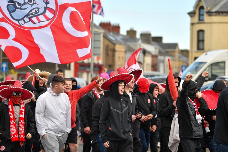 Fans of Larne march to the stadium before this evening’s game at Inver Park