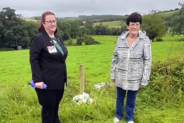 Cpl Criddle's daughter Sarah Criddle (left) and his widow Julia Wilson laying flowers at the scene where he was fatally injured in Clogher in 1973. Photo: SEFF/PA Wire
