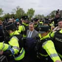 Former DUP leader Jeffrey Donaldson leaving Newry Magistrates' Court, after he was released on bail for child sex abuse charges in April 2024
