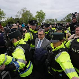 Former DUP leader Jeffrey Donaldson leaving Newry Magistrates' Court, after he was released on bail for child sex abuse charges in April 2024