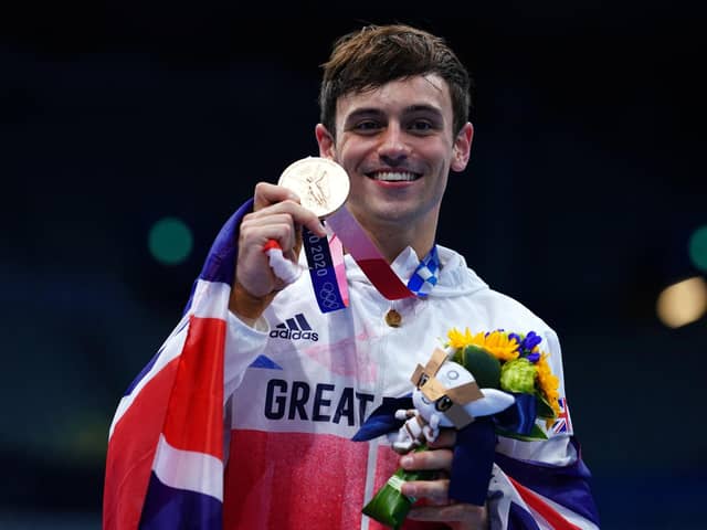 Tom Daley winning an Olympic gold medal in 2021.