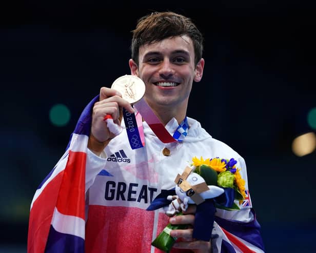 Tom Daley winning an Olympic gold medal in 2021.