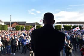 Jamie Bryson addresses the crowd during an anti-Northern Ireland Protocol protest rally on June 18, 2021 in Newtownards, Northern Ireland