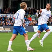 Rangers' James Tavernier (right) celebrates scoring their side's second goal of the game with team-mates during the cinch Premiership match at the Global Energy Stadium, Dingwall. PIC: Robert Perry/PA Wire.