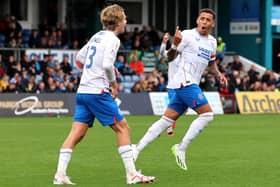 Rangers' James Tavernier (right) celebrates scoring their side's second goal of the game with team-mates during the cinch Premiership match at the Global Energy Stadium, Dingwall. PIC: Robert Perry/PA Wire.