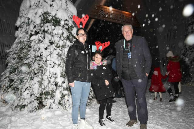 Gerry Kelly, President of NI Children to Lapland and Days to Remember Trust is with Kirsten and Jacqueline Thompson as the arrive at Santa Park in Lapland. Pic by Declan Roughan dvrphoto@me.com