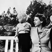 Undated picture of the Queen Elizabeth II with her two children Charles (R) and Ann, posing in Balmoral. (Photo by - / AFP) (Photo by -/-/AFP via Getty Images)