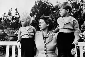 Undated picture of the Queen Elizabeth II with her two children Charles (R) and Ann, posing in Balmoral. (Photo by - / AFP) (Photo by -/-/AFP via Getty Images)