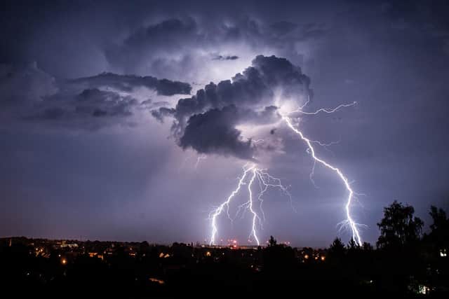 Lightning strikes from a cloud during a thunderstorm above the city of Goerlitz, eastern Germany